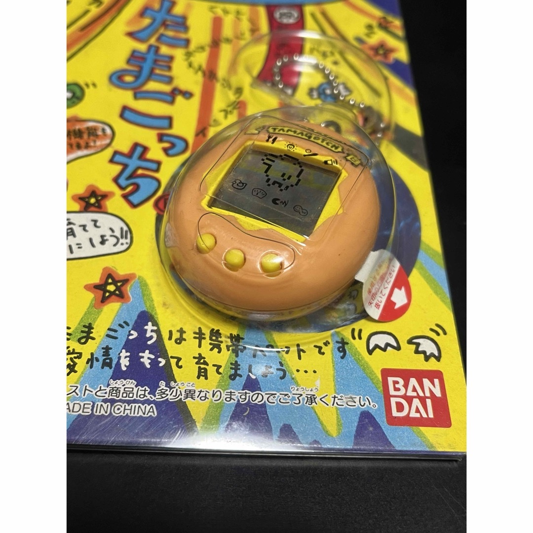 BANDAI - たまごっち 初代 オレンジ 未開封の通販 by 出張中一部 BANDAI - たまごっち 初代 オレンジ 未開封の通販 by 出張中一部