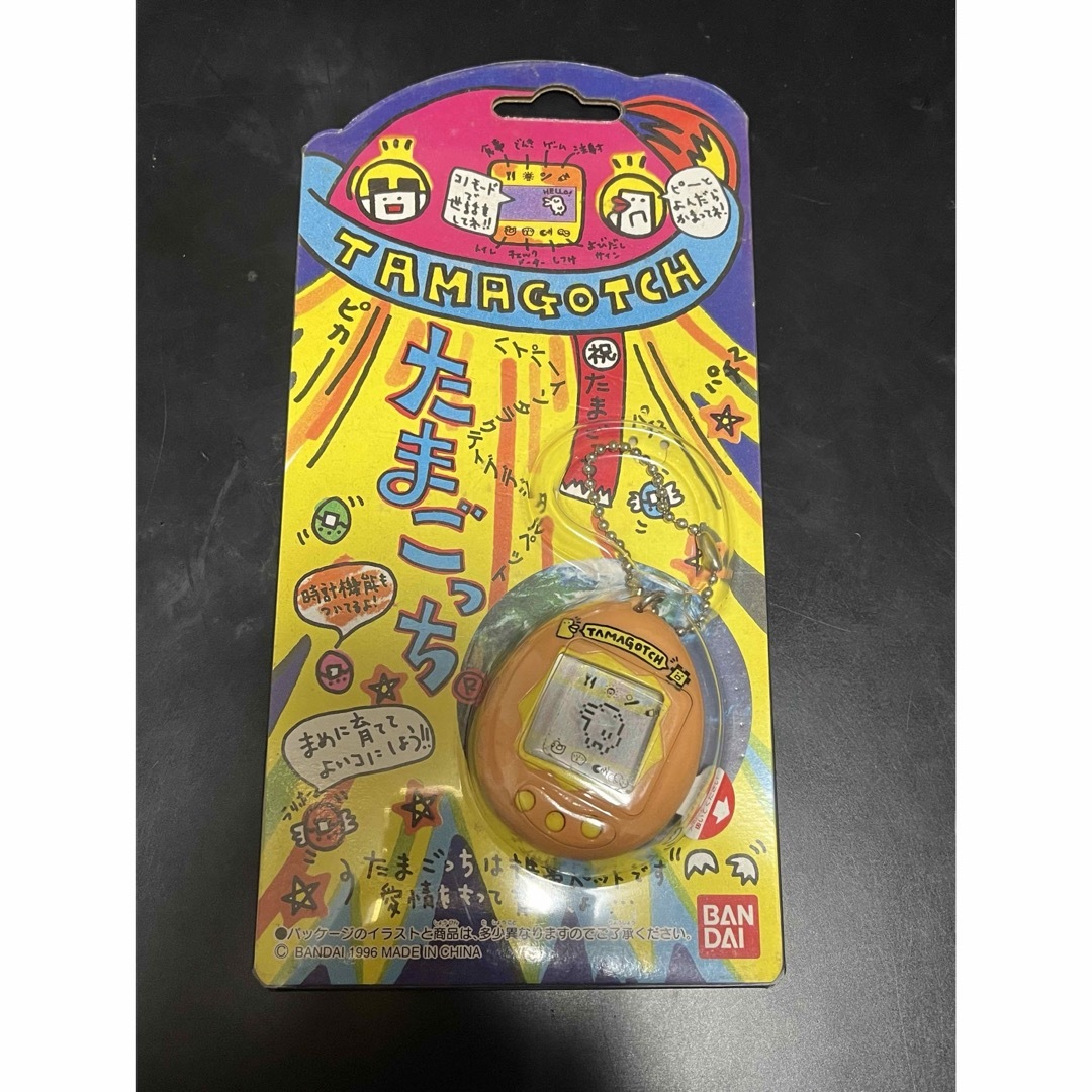 BANDAI - たまごっち 初代 オレンジ 未開封の通販 by 出張中一部 BANDAI - たまごっち 初代 オレンジ 未開封の通販 by 出張中一部