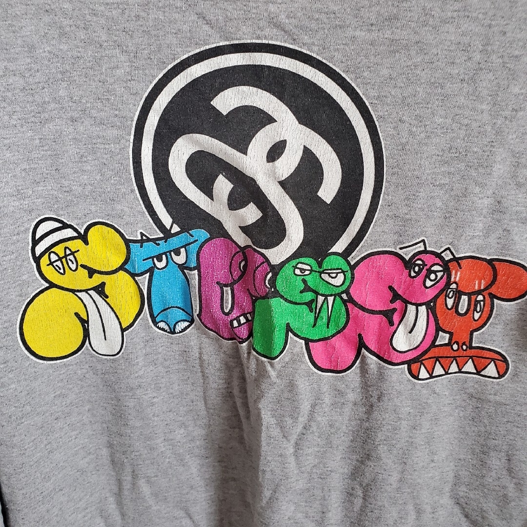 STUSSY(ステューシー)のオールドステューシーのシャネルグラフィックロンT　グレー　M メンズのトップス(Tシャツ/カットソー(七分/長袖))の商品写真