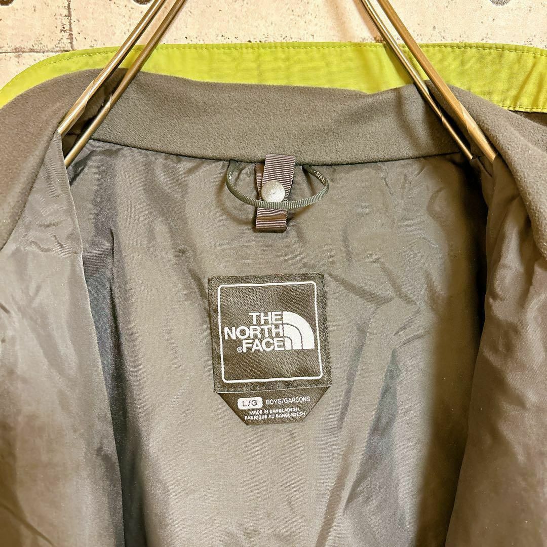 THE NORTH FACE(ザノースフェイス)の【美品】ノースフェイス　マウンテンパーカー　黄緑　キッズ150cm相当 キッズ/ベビー/マタニティのキッズ服女の子用(90cm~)(ジャケット/上着)の商品写真