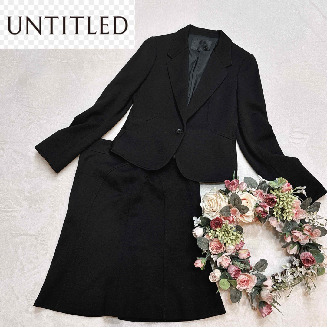 UNTITLED(アンタイトル)の美品 アンタイトル セットアップスーツ スカート フレア 日本製　黒 レディースのフォーマル/ドレス(スーツ)の商品写真