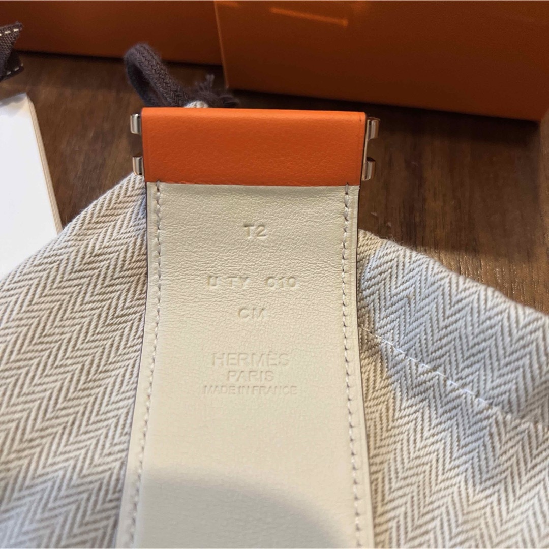 Hermes(エルメス)の新品　エルメス　ブレスレット　エラン　HERMES レザー　オレンジ　ホワイト レディースのアクセサリー(ブレスレット/バングル)の商品写真