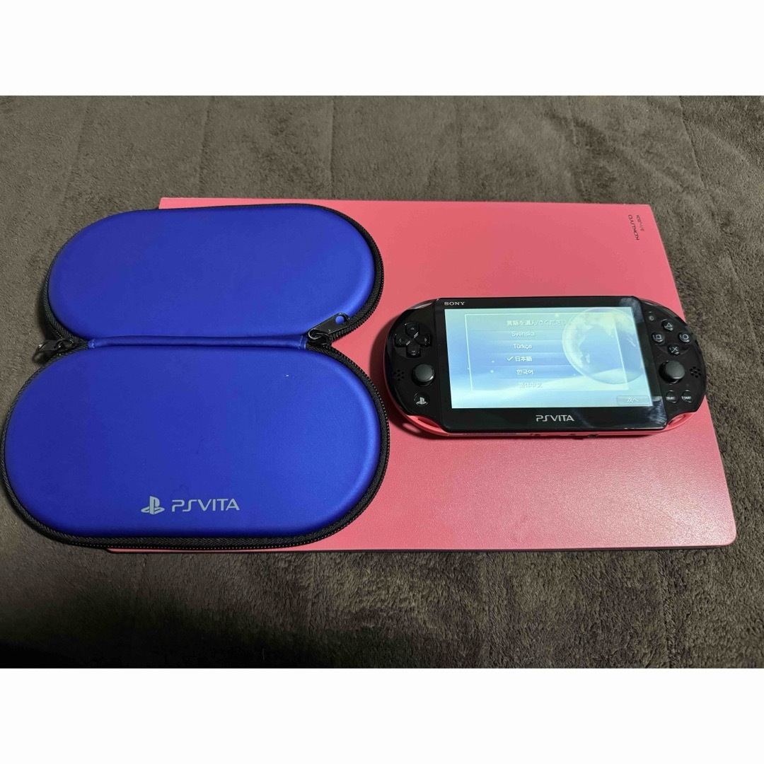 PlayStation Vita(プレイステーションヴィータ)のvita   ピンクブラック　2番 エンタメ/ホビーのゲームソフト/ゲーム機本体(携帯用ゲーム機本体)の商品写真