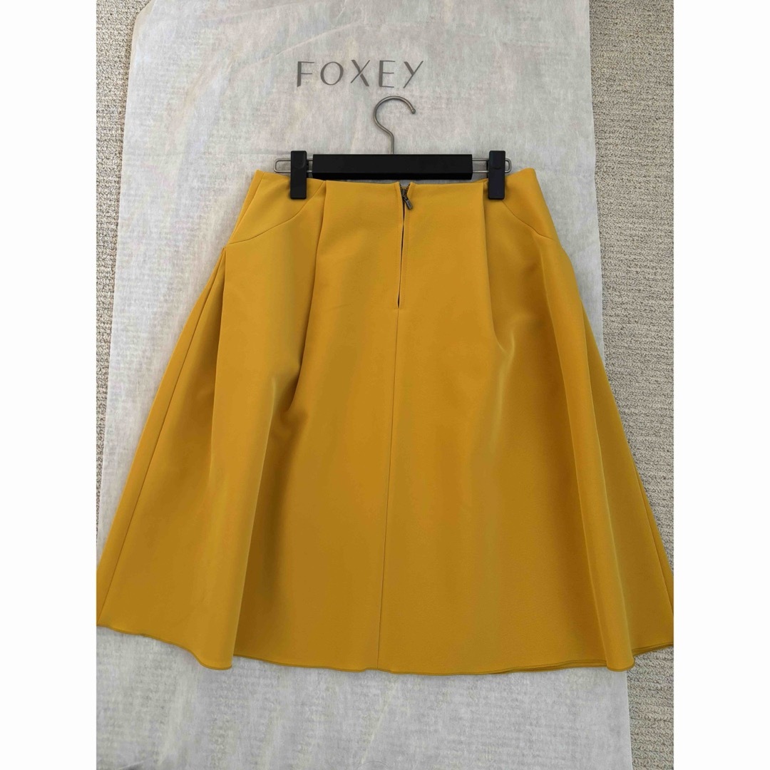 FOXEY NEW YORK(フォクシーニューヨーク)のお値下げ　FOXEY NY スカート イリプスフレアー 40 イエロー レディースのスカート(ひざ丈スカート)の商品写真