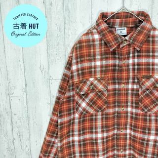 カーハート(carhartt)のCarhartt　厚手　ネルシャツ　革ロゴ　チェック柄　ワンポイント　古着(シャツ)