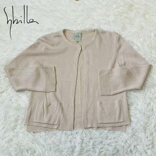 シビラ(Sybilla)のsybilla シビラ　カーディガン　アイボリー　無地(カーディガン)