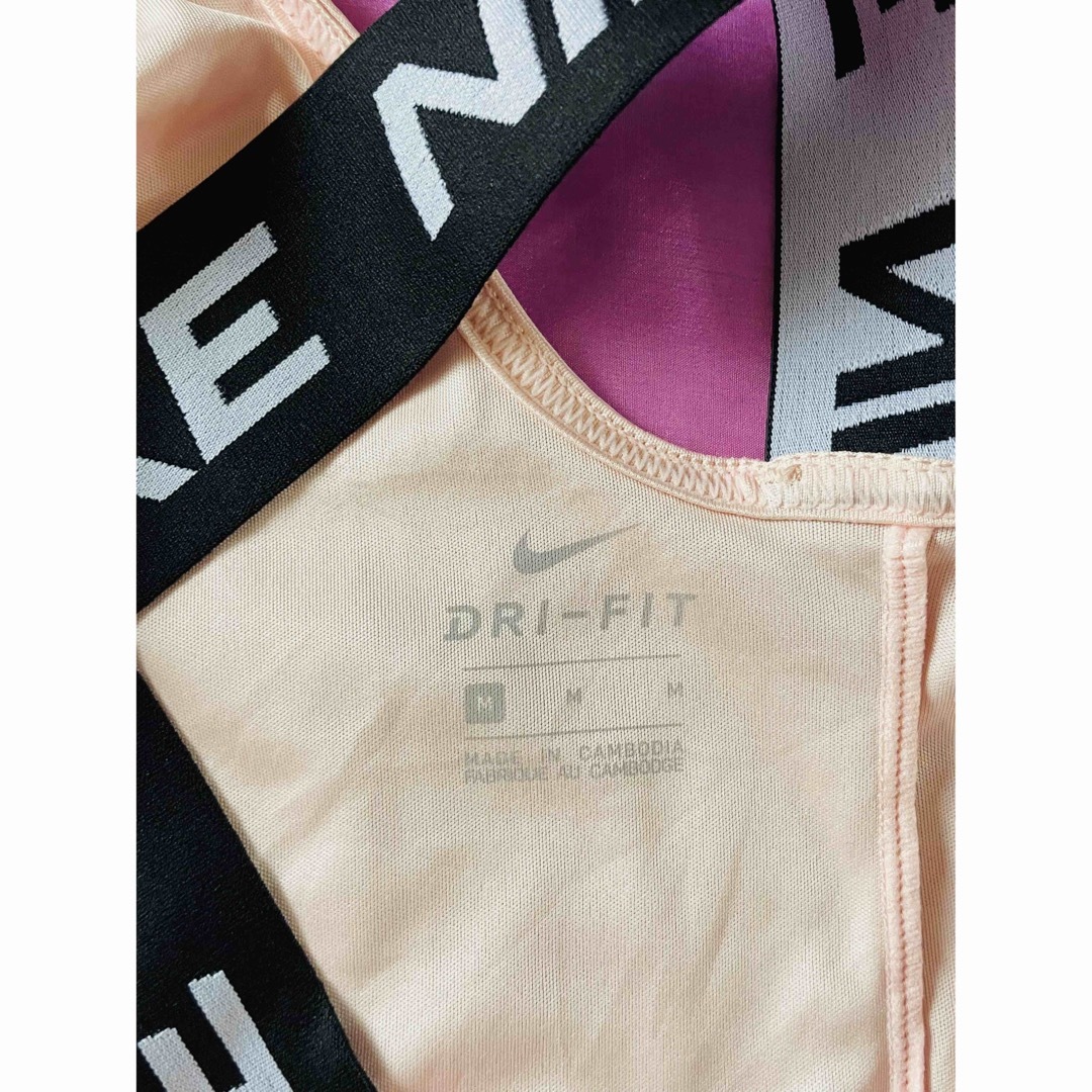 NIKE(ナイキ)のNIKE ドライフィット　レディース　タンクトップ　M  薄いピンク　ジム レディースのトップス(Tシャツ(半袖/袖なし))の商品写真