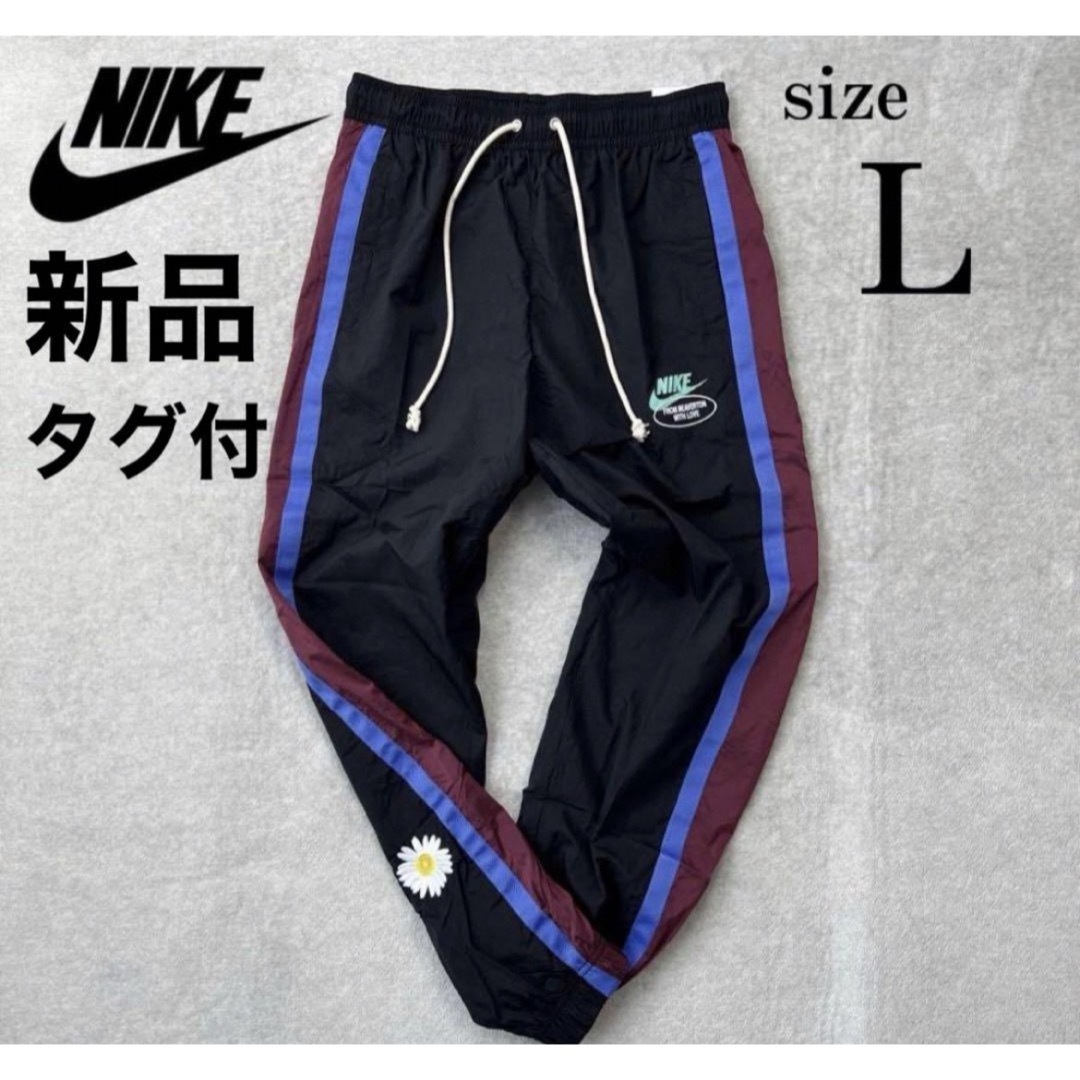 撥水加工 NIKE ナイロン パンツ ジャージ ブラック ブルー 花柄　L | フリマアプリ ラクマ