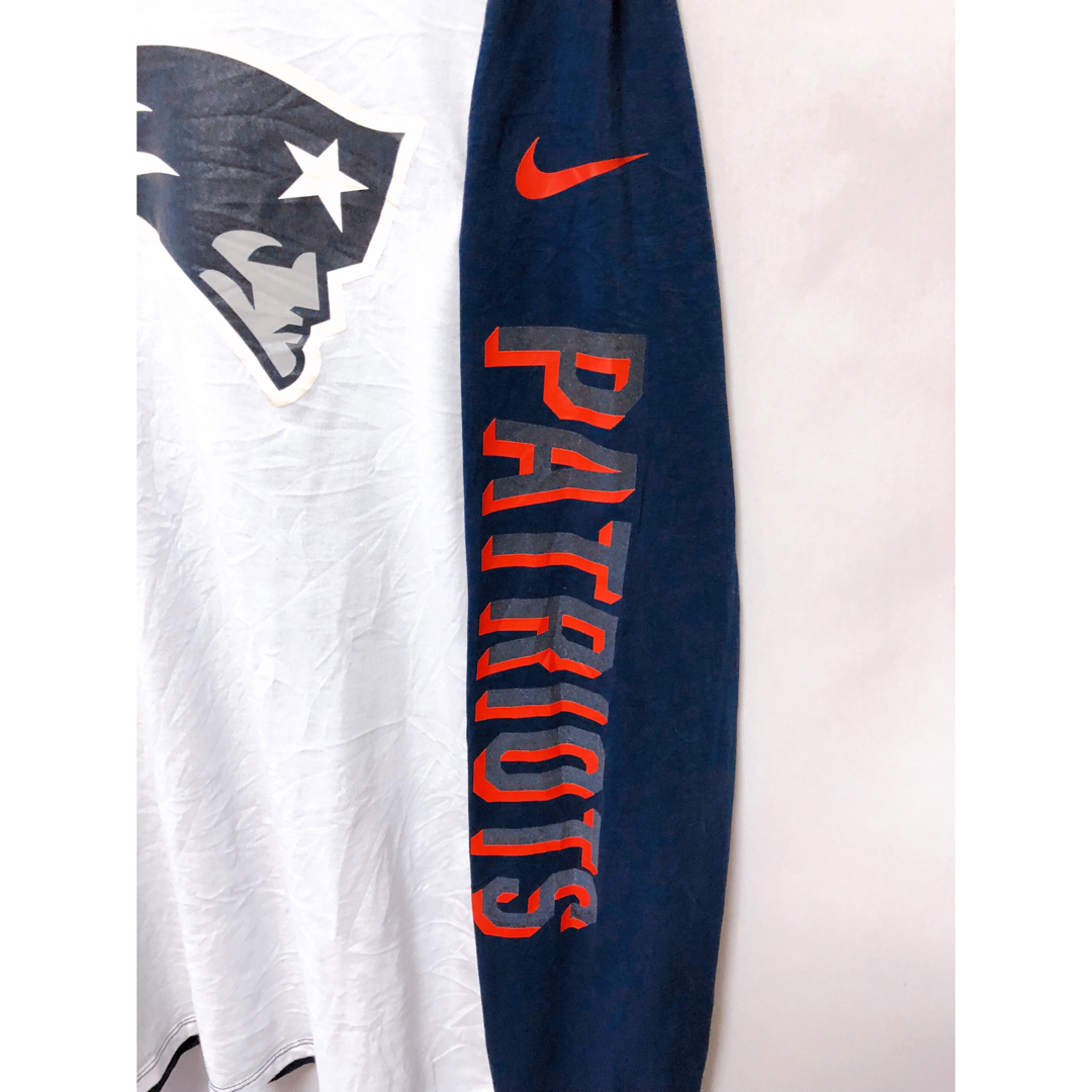 NIKE(ナイキ)のNFL　ニューイングランド・ペイトリオッツ　長袖Ｔシャツ　L　白✕紺　USA古着 メンズのトップス(Tシャツ/カットソー(七分/長袖))の商品写真