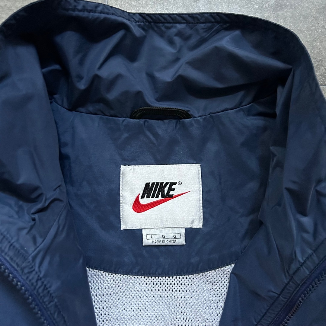 NIKE(ナイキ)の90s NIKE ナイキ ナイロンジャケット 白タグ ネイビー L メンズのジャケット/アウター(ナイロンジャケット)の商品写真