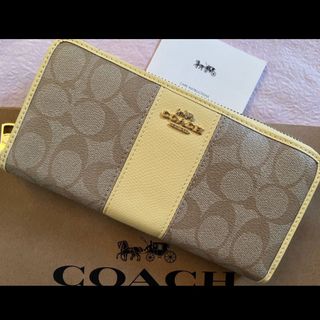 コーチ(COACH)の新品　COACH 長財布　イエロー　シグネチャー　ラウンドファスナー　小銭入れ有(財布)