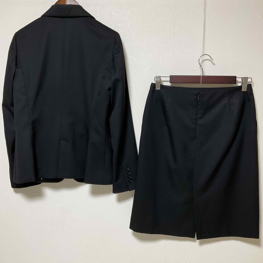 【美品】イネド スカートスーツ 9 日本製 毛 黒 就活 OL ビジネス 春秋冬