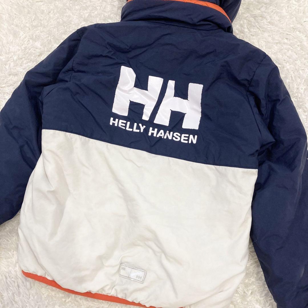 HELLY HANSEN(ヘリーハンセン)のヘリーハンセン　キッズ　リバーシブル　ダウン　アウター　オレンジ　130 キッズ/ベビー/マタニティのキッズ服男の子用(90cm~)(ジャケット/上着)の商品写真