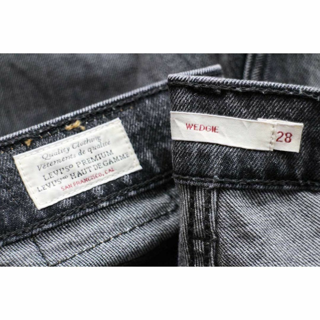 Levi's(リーバイス)のLEVI'Sリーバイス PREMIUM WEDGIE 22861 BIGE ストレッチ ブラック デニムパンツ 28★ジーンズ テーパード ハイライズ レザーパッチ 黒 レディースのパンツ(デニム/ジーンズ)の商品写真