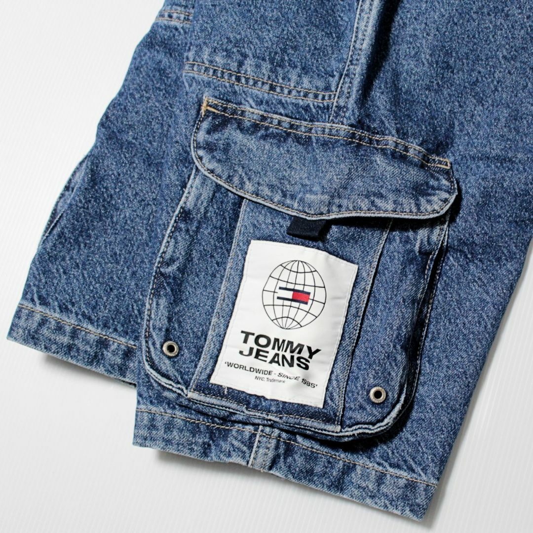 TOMMY JEANS(トミージーンズ)の新品 トミージーンズ リジットデニムカーゴハーフパンツ ウエスト84cm メンズのパンツ(ワークパンツ/カーゴパンツ)の商品写真