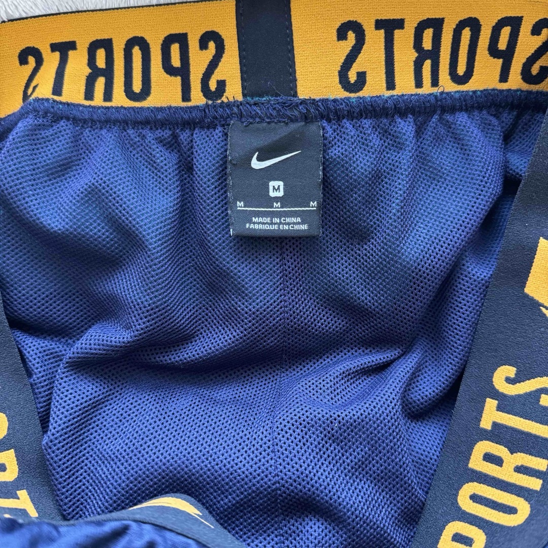 NIKE(ナイキ)のナイキ スポーツ パンツ 古着 ランニング アウトドア ドライ メンズのパンツ(ショートパンツ)の商品写真