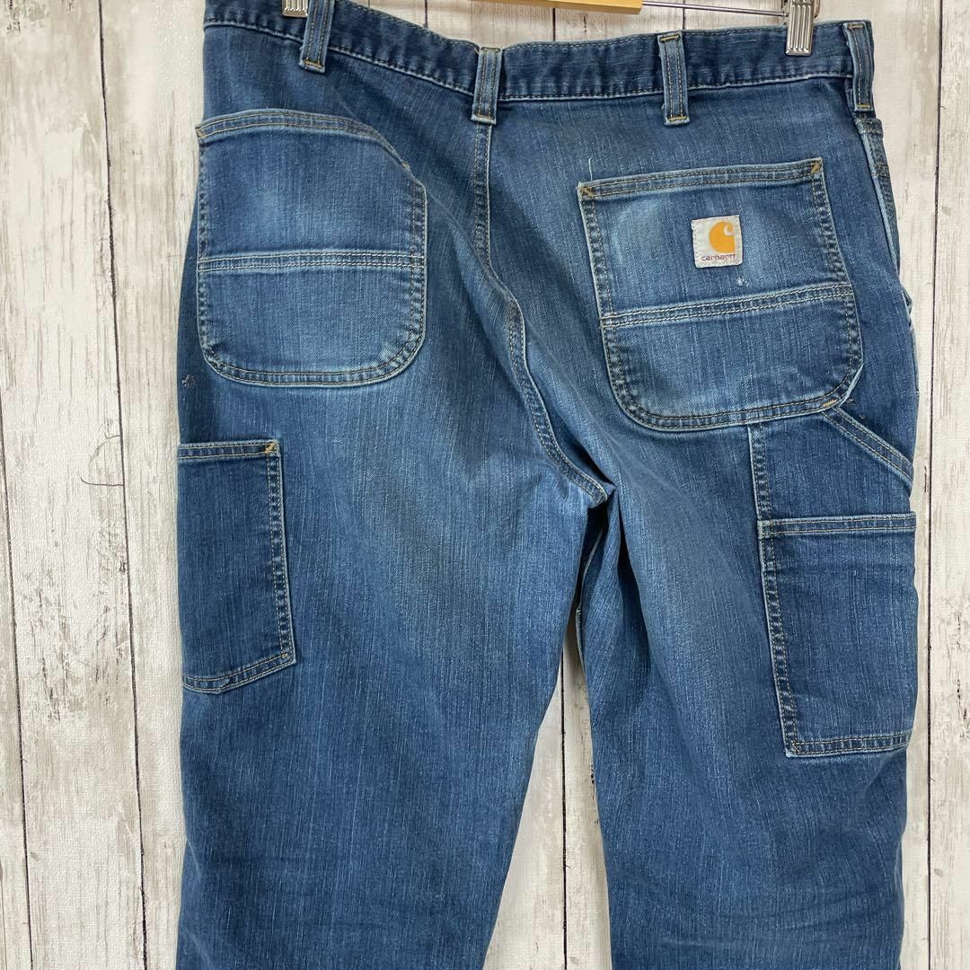 carhartt(カーハート)のカーハート　Ｗ36　ダブルニーデニムパンツ　ワークパンツ　青ブルー　メンズ　古着 メンズのパンツ(ペインターパンツ)の商品写真