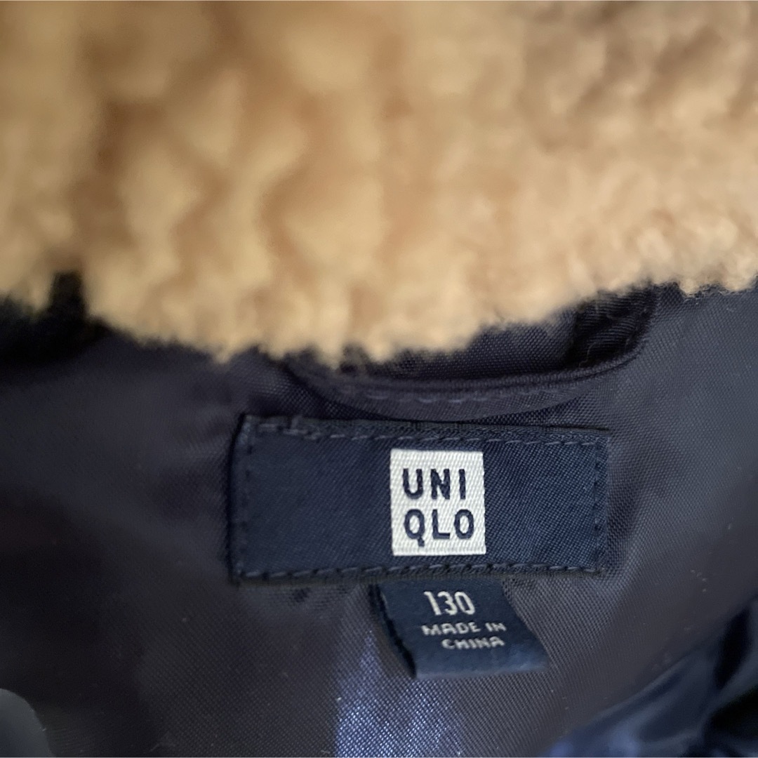 UNIQLO(ユニクロ)のUNIQLO ユニクロ　ダウンコート　130 ネイビー キッズ/ベビー/マタニティのキッズ服女の子用(90cm~)(コート)の商品写真