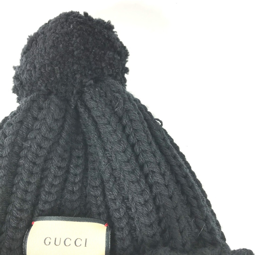 Gucci(グッチ)のグッチ GUCCI ロゴ 652656 ポンポン付き ビーニー 帽子 ニット帽 ニットキャップ ニット帽 ポリエステル ブラック 美品 レディースの帽子(ニット帽/ビーニー)の商品写真