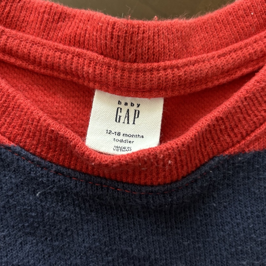 babyGAP(ベビーギャップ)のbaby GAP yellow face セーター2枚組 キッズ/ベビー/マタニティのベビー服(~85cm)(ニット/セーター)の商品写真