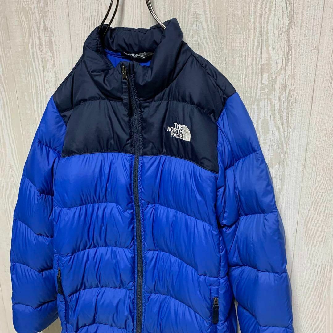 THE NORTH FACE(ザノースフェイス)の【人気】ノースフェイス　ダウン　ヌプシ　キッズ160  ブラック×ブルー キッズ/ベビー/マタニティのキッズ服男の子用(90cm~)(ジャケット/上着)の商品写真