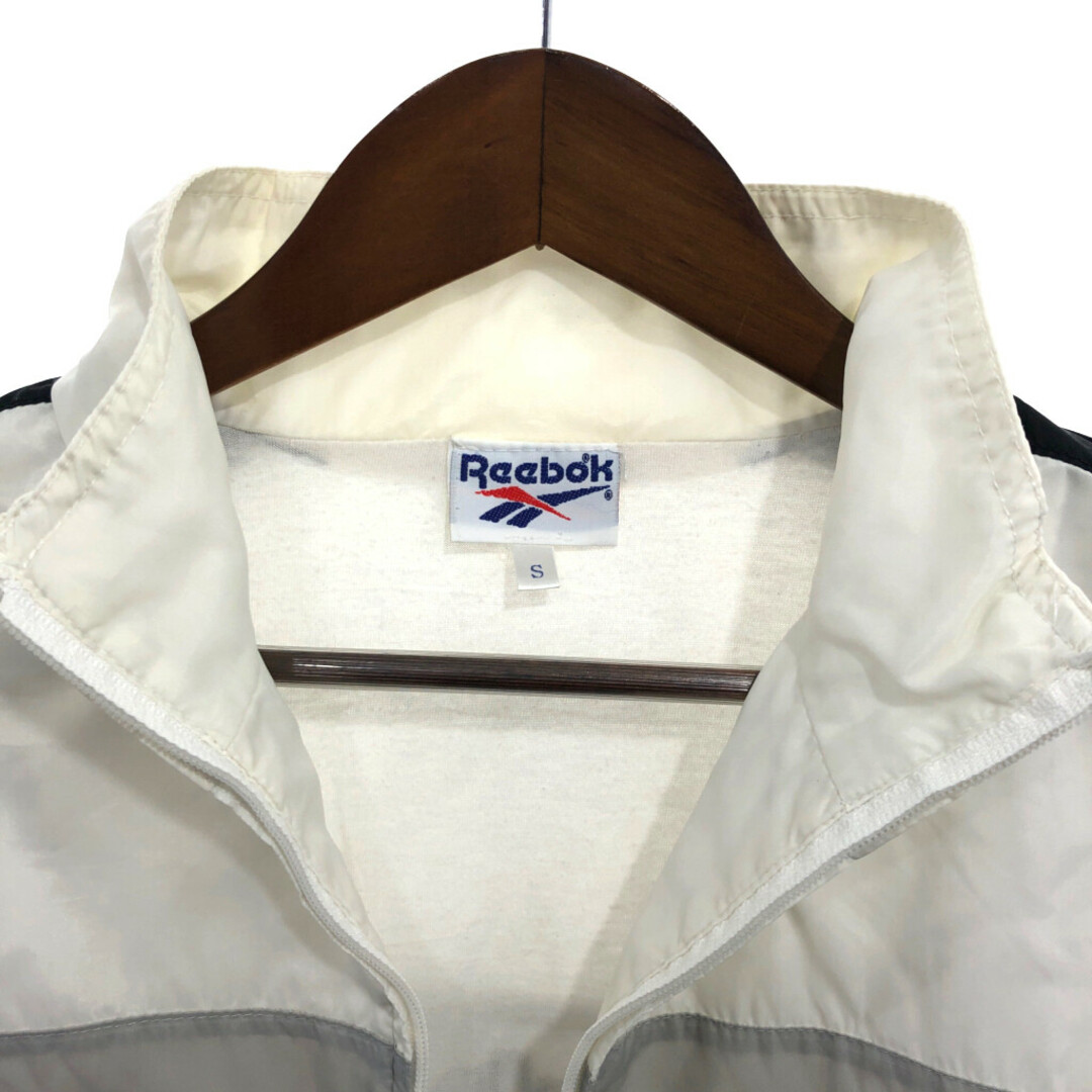 Reebok(リーボック)の90年代 Reebok リーボック トラックジャケット アウター スポーツ ワンポイントロゴ ホワイト (メンズ S) 中古 古着 P6293 メンズのジャケット/アウター(その他)の商品写真
