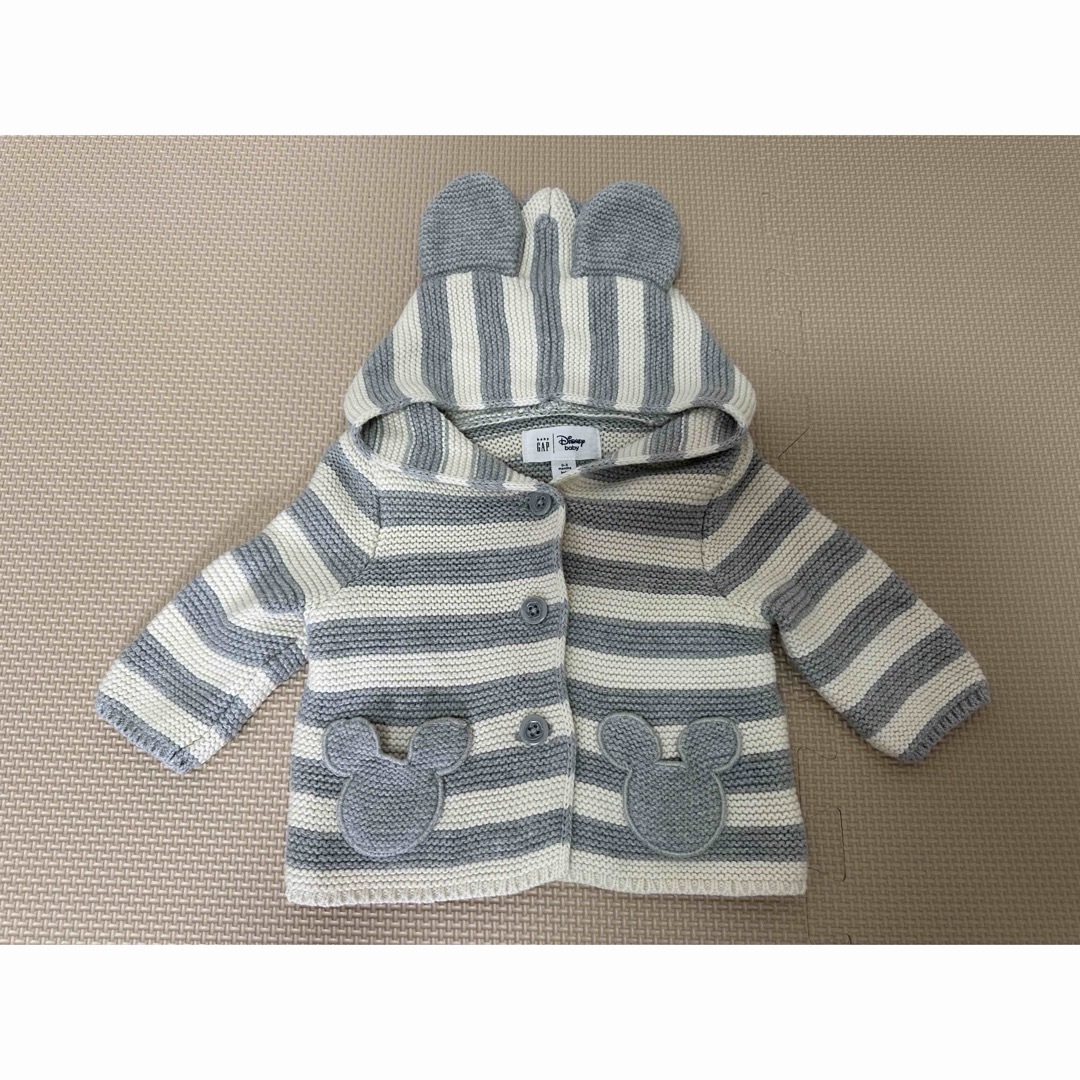 babyGAP(ベビーギャップ)の【ベビーギャップ×ディズニー】ミッキー耳付　ニットカーディガン　50cm キッズ/ベビー/マタニティのベビー服(~85cm)(カーディガン/ボレロ)の商品写真