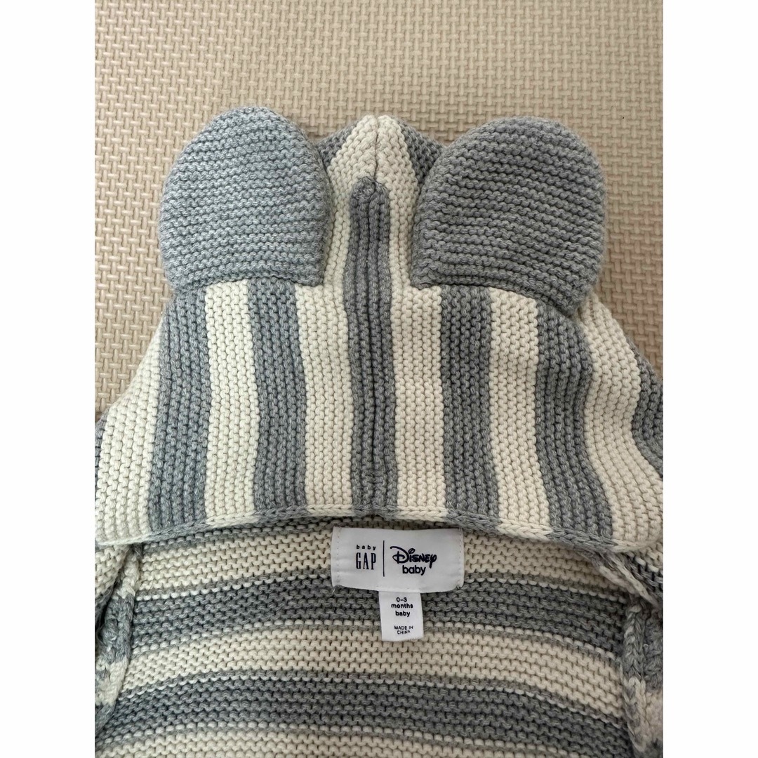 babyGAP(ベビーギャップ)の【ベビーギャップ×ディズニー】ミッキー耳付　ニットカーディガン　50cm キッズ/ベビー/マタニティのベビー服(~85cm)(カーディガン/ボレロ)の商品写真