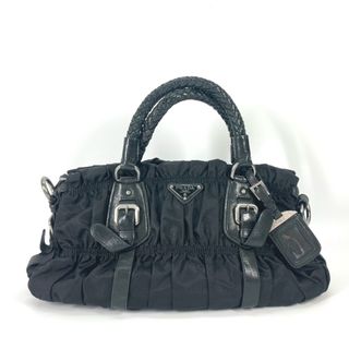 プラダ(PRADA)のプラダ PRADA トライアングルロゴ 三角ロゴ プレート ミニボストンバッグ カバン フリル ハンドバッグ ナイロン ブラック(ハンドバッグ)