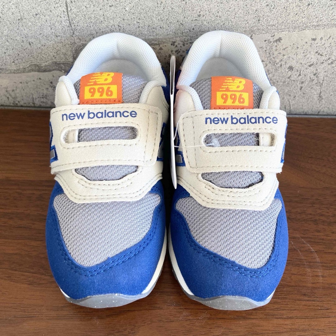 New Balance(ニューバランス)の【新品】14センチ ブルー×オレンジ ニューバランス スニーカー キッズ キッズ/ベビー/マタニティのベビー靴/シューズ(~14cm)(スニーカー)の商品写真