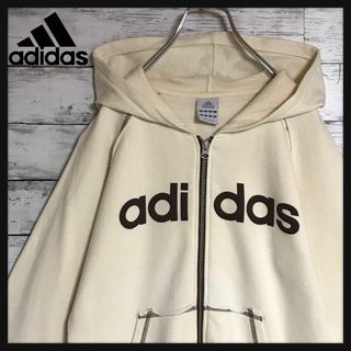 アディダス(adidas)の【万国旗タグ】アディダス　ロゴ入りジップパーカー　クリーム　裏起毛　I11(パーカー)