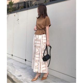 アメリヴィンテージ(Ameri VINTAGE)のCHAPLIN MESSAGE LOGO PLEATS SKIRT(ロングスカート)