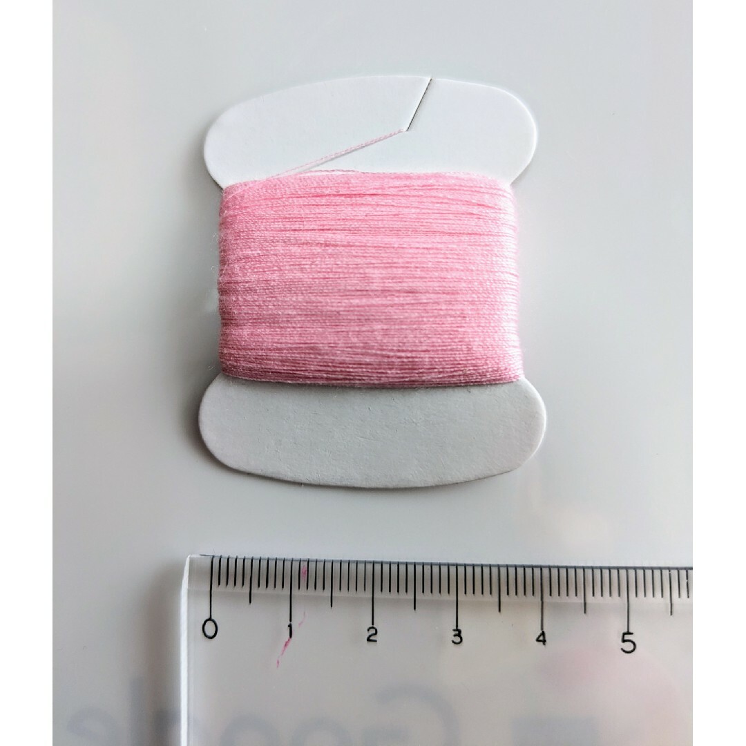 ピンク色手縫い糸　50m✕50個(アウトレット) ハンドメイドの素材/材料(生地/糸)の商品写真