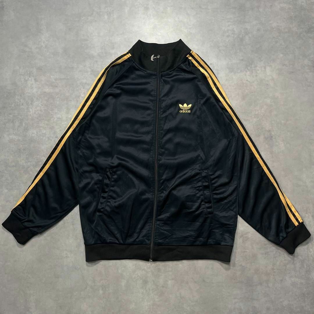 adidas(アディダス)の【Adidas】アディダス ブラックゴールド トラックジャケット ジャージ メンズのトップス(ジャージ)の商品写真