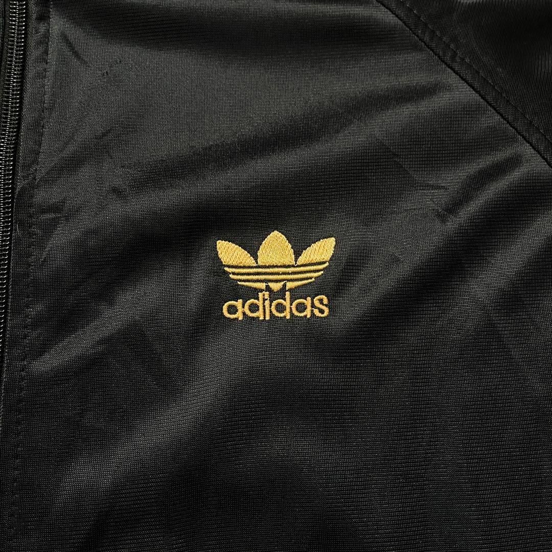 adidas(アディダス)の【Adidas】アディダス ブラックゴールド トラックジャケット ジャージ メンズのトップス(ジャージ)の商品写真