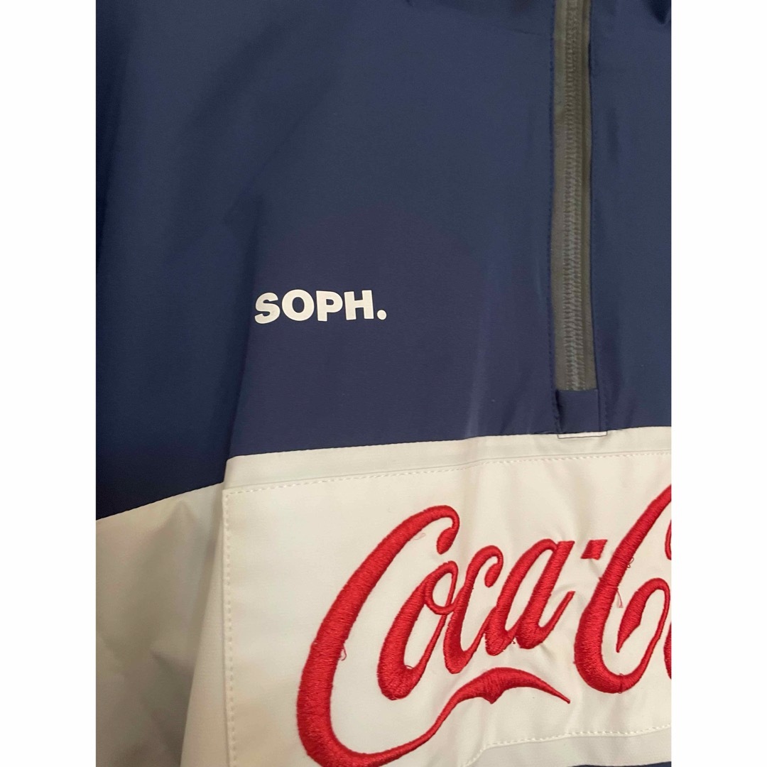 F.C.R.B.(エフシーアールビー)のF.C.R.B.x COCA-COLA HALF ZIP ANORAK メンズのジャケット/アウター(ナイロンジャケット)の商品写真