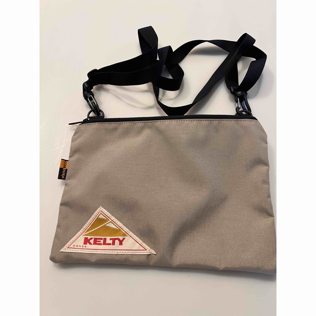 KELTY(ケルティ)のKELTY VINTAGE FLAT POUCH S メンズのバッグ(バッグパック/リュック)の商品写真