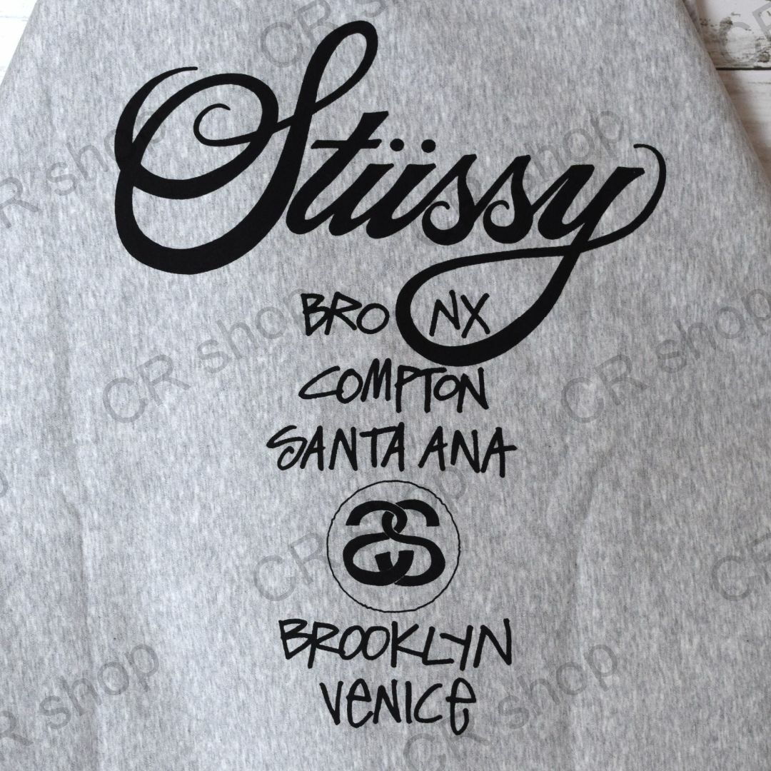 STUSSY(ステューシー)の【ステューシー】正規・新品タグ　ワールドツアー　グレー　XL　フルジップパーカー メンズのトップス(パーカー)の商品写真