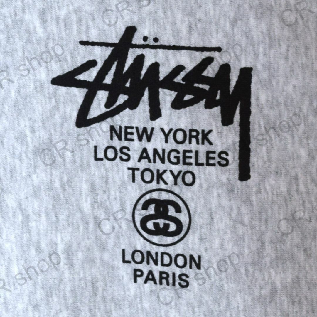 STUSSY(ステューシー)の【ステューシー】正規・新品タグ　ワールドツアー　グレー　XL　フルジップパーカー メンズのトップス(パーカー)の商品写真