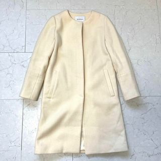 スピックアンドスパン(Spick & Span)の【スピックアンドスパン】美品 38 ウール ノーカラー コート 白 アイボリー(ロングコート)