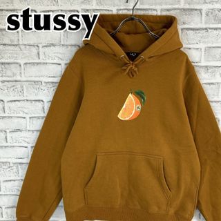 ステューシー(STUSSY)のstussy ステューシー パーカー フルーツ オレンジ プリント 希少デザイン(パーカー)