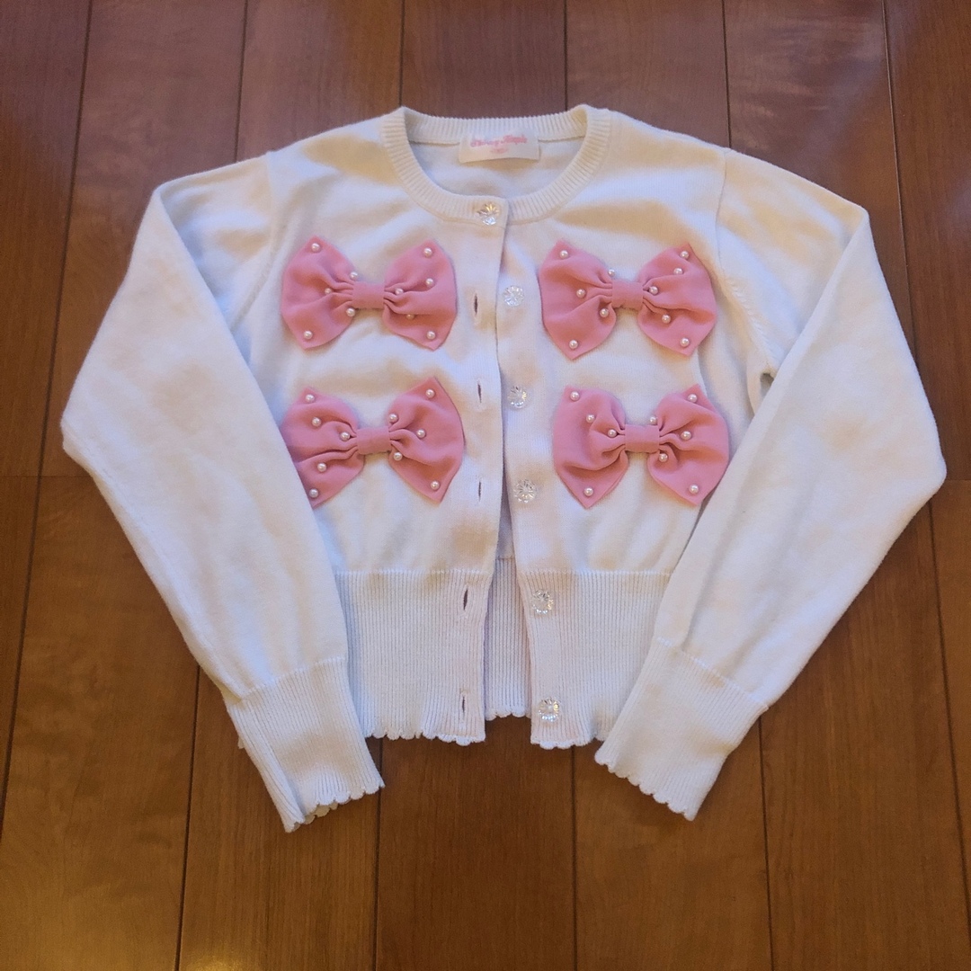 Shirley Temple(シャーリーテンプル)のシャーリーテンプル⭐︎りぼんカーディガン白ピンク130 120 キッズ/ベビー/マタニティのキッズ服女の子用(90cm~)(Tシャツ/カットソー)の商品写真