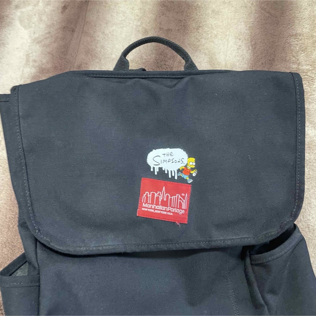 Manhattan Portage(マンハッタンポーテージ)の【超希少品・入手困難】マンハッタンポーテージ　シンプソンズ　コラボ　リュック　黒 メンズのバッグ(バッグパック/リュック)の商品写真