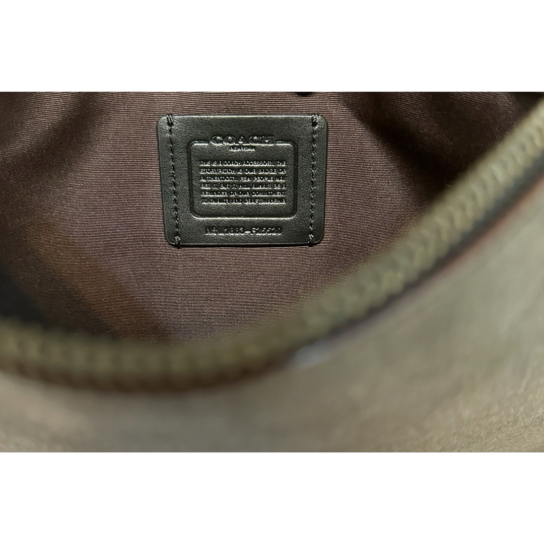 COACH(コーチ)のコーチ シグネチャー 馬車 PVC クラッチバッグ ブラック メンズ メンズのバッグ(セカンドバッグ/クラッチバッグ)の商品写真