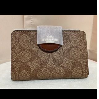 コーチ(COACH)の新品　COACH　二つ折り財布　小銭入れ有　ベージュ　シグネチャー(財布)