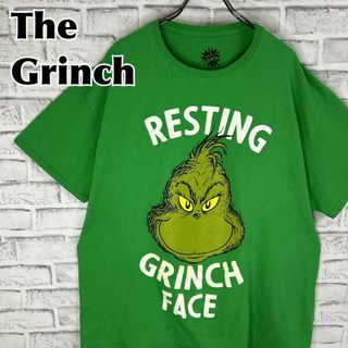 ティービーアンドムービー(TV&MOVIE)のThe Grinch グリンチ フェイス ロゴプリント Tシャツ 半袖 輸入品(Tシャツ/カットソー(半袖/袖なし))