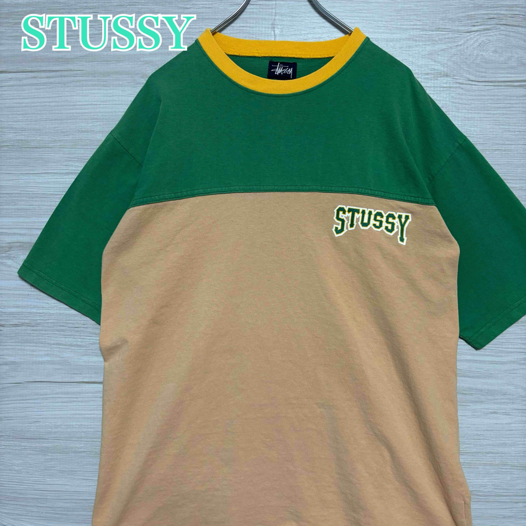 STUSSY(ステューシー)の【入手困難】STUSSY ステューシー　Tシャツ　Lサイズ　紺タグ　両面デザイン メンズのトップス(Tシャツ/カットソー(半袖/袖なし))の商品写真