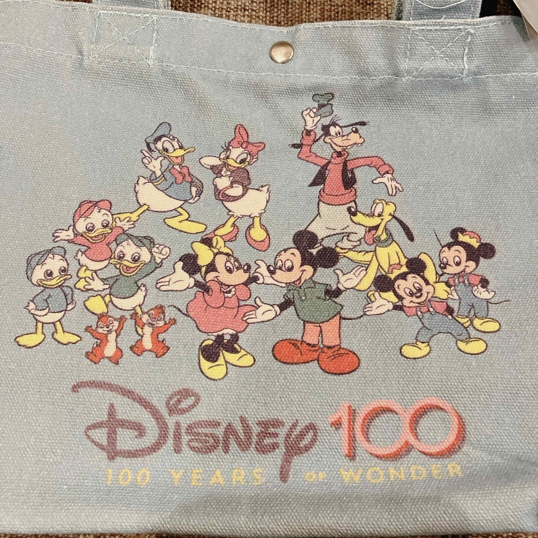 Disney(ディズニー)の新品 ☆ ディズニー 100　トートバッグ　タグ付き　しまむら アベイル エンタメ/ホビーのおもちゃ/ぬいぐるみ(キャラクターグッズ)の商品写真