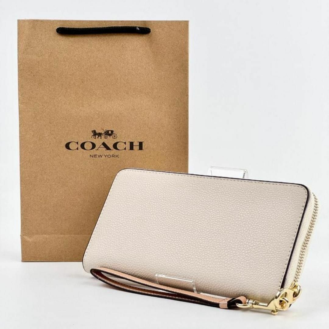 COACH(コーチ)の新品 COACH 長財布 バニラクリーム レザー調 ホース ロングジップ レディースのファッション小物(財布)の商品写真