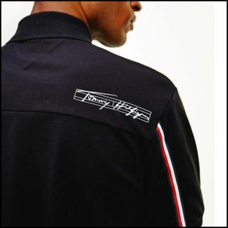 トミーヒルフィガー(TOMMY HILFIGER)のBACK LOGO ZIP POLO ブラック Mサイズ　定価15400円(ポロシャツ)